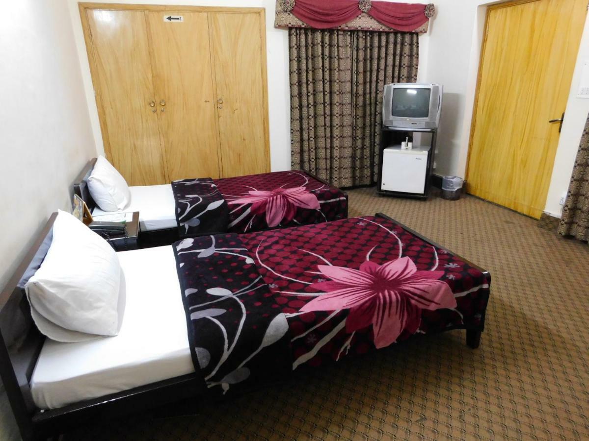 The City Lodge Islamabad Extérieur photo